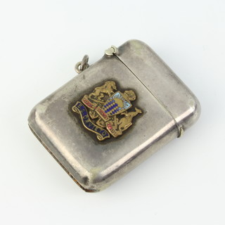 A silver plated vesta with enamelled armorial 