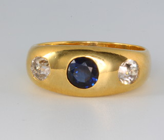 A gentleman's 18ct yellow gold sapphire and diamond gypsy ring size S 