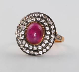 A Victorian style yellow gold cabochon cut ruby and white sapphire ring size P 