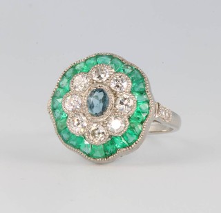 A platinum aquamarine diamond and emerald floral ring size N 1/2