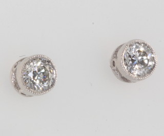 A pair of 18ct white gold single stone diamond ear studs approx. 0.4ct
