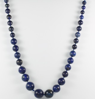 A string of graduated lapis lazuli beads 60cm 