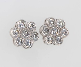 A pair of 18ct white gold diamond daisy cluster ear studs, approx. 2.25ct 