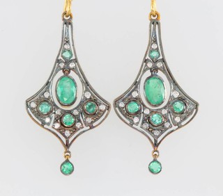 A pair of Art Nouveau style yellow gold emerald and diamond drop earrings 