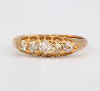 An 18ct yellow gold 5 stone diamond ring size N