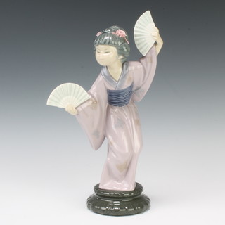 A Lladro figure of a Japanese lady dancer holding fans 30cm 