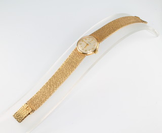 A lady's 9ct yellow gold Omega mechanical wristwatch on a ditto bracelet 25 grams