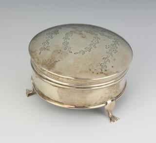 A circular silver trinket box with chased swags, ribbons and laurels Birmingham 1919 8cm 