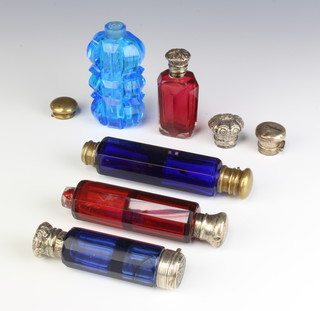 An Edwardian red glass silver mounted scent bottle and 4 other scent bottles
