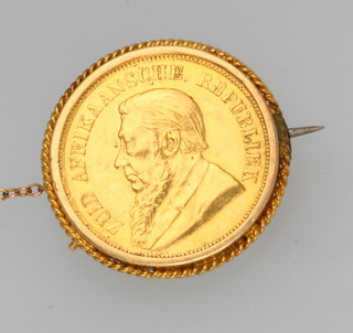 An 1898 South African 1 pond in an 18ct yellow gold mount, gross 11 grams