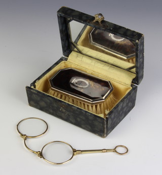 A pair of gilt lorgnettes and a cased hairbrush