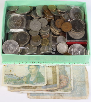 A quantity of commemorative crowns and coins including bank notes