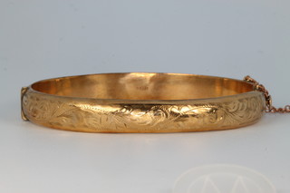 A 9ct yellow gold hollow bangle 12 grams