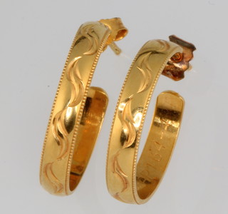 A pair of 18ct yellow gold earrings 6 grams