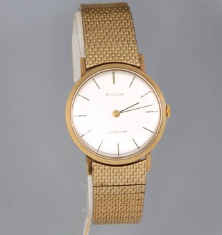 A gentleman's 9ct yellow gold Bulova Longchamps wristwatch on an expanding bracelet 