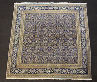 A blue and brown ground Persian carpet with overall geometric design 119cm x 220, some wear 