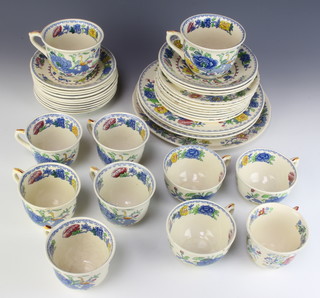 A Masons Ironstone Regency design tea and coffee service comprising 2 large tea cups, 3 small tea cups, 6 coffee cups, 3 large saucers, 11 small saucers, 8 side plates, 3 large plates and 1 bowl 