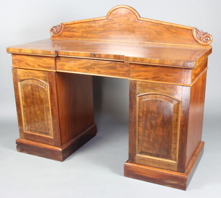 A Victorian mahogany inverted breakfront sideboard with raised back fitted 1 long drawer flanked by 2 short drawers the pedestals fitted cupboards enclosed by oval panelled doors 124cm h x 153cm w x 61cm d  