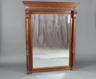 A 19th Century Continental rectangular bevelled plated over mantel mirror contained in a carved oak frame with moulded and shaped cornice supported by a pair of turned columns 62cm h x 49cm w x 17cm d 