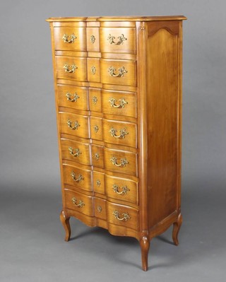A French walnut chest of serpentine outline fitted 6 long drawers raised on cabriole supports 131cm h x 62cm w x 39cm d 