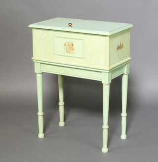 A rectangular green painted trunk with hinged lid, raised on turned supports 78cm h x 59cm w x 33cm d 