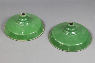A pair of mid 20th Century circular green and white enamelled industrial style light shades 19cm x 36cm  

