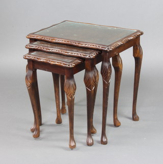 A nest of 3 carved mahogany interfitting coffee tables raised on cabriole supports 55cm h x 55cm w x 41cm d 