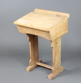 A child's 19th Century stripped and polished pine school desk 84cm h x 56cm w x 46cm d 
