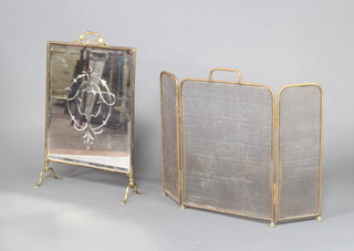 A Victorian Art Nouveau brass and cut bevelled glass fire screen 68cm x 46cm x 15cm together with a brass and mesh 3 fold spark guard 
