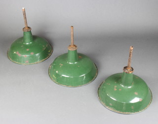 3 Revo mid 20th Century green and white enamelled light shades 30cm x 41cm diam. (some chips to the enamelling) 

