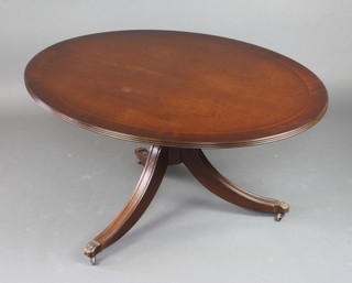 A Georgian style oval pedestal coffee table with crossbanded top 52cm h x 107cm l x 81cm w 