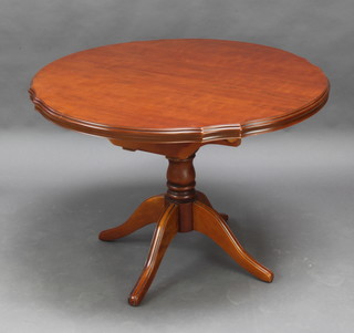 A mahogany pedestal dining table with 1 extra leaf 74cm h x 106cm w x105cm d 