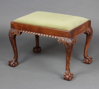 A Chippendale style rectangular mahogany stool with upholstered drop in seat, raised on carved cabriole, ball and claw supports 44cm h x 61cm w x 45cm d 