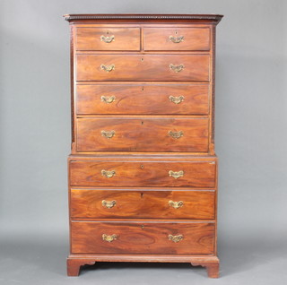 A Georgian mahogany chest on chest, the upper section with moulded and dentil cornice above 2 short and 3 long drawers, with canted and blind fretwork decoration to the sides, the base fitted 3 long drawers and raised on bracket feet 184cm h x 110cm w x 55cm d 