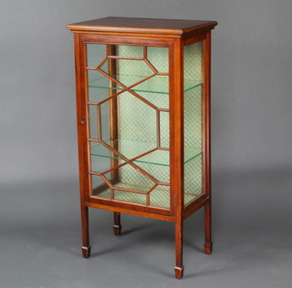 An Edwardian mahogany display cabinet, fitted shelves enclosed by astragal glazed panelled doors, raised on square tapered supports spade feet 110cm h x 56cm w x 37cm d 