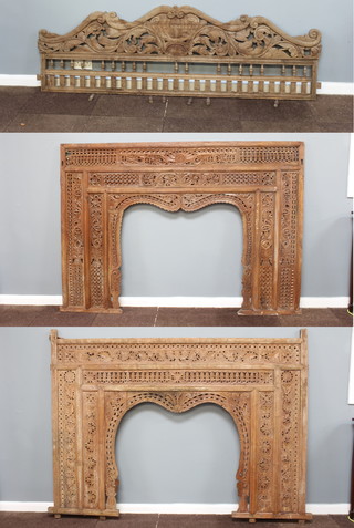 2 sections of Indian pierced carved hardwood panelling 162cm x 221cm together with an arched section of panelling 68cm x 162cm 