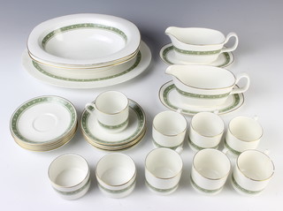 A Royal Doulton Rondelay pattern coffee and part dinner service comprising 7 coffee cans, 10 saucers, 2 sugar bowls, 2 sauce boats and 2 stands, 2 vegetable dishes and a meat plate 