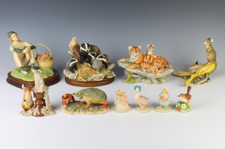 A Border Fine Arts Group Evening Shadows SOG7 12cm, ditto Bengal Tigress and Cubs WWB30 11cm, hedgehog 6cm, a field mouse on a banana 13cm, a seated clown with basket of flowers 14cm, a wren 6cm, Jemima Puddleduck 7cm and 3 composition figures 