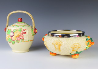 A Clarice Cliff Celtic Harvest salad bowl with chrome rim and a Royal Staffordshire pottery biscuit barrel and lid 