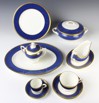 A Coalport Athlone Blue tea, coffee and dinner service comprising 8 coffee cans, 8 saucers,6 tea cups, 6 saucers, 6 two handled bowls, 6 saucers, milk jug, sugar bowl and lid, 13 small plates, 19 medium plates, 13 dinner plates, tureen and lid, 2 bowls and a meat plate