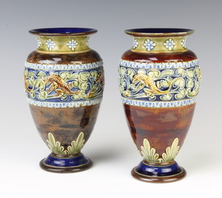 A pair of Royal Doulton oviform vases decorated with a band of lizards and insects, impressed marks 17cm 