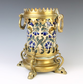 A Doulton Lambeth oil lamp base decorated with scrolling flowers 1880, the 15.5cm cylindrical body with brass stand and mounts