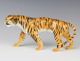 A Beswick figure - Tigress no.1486 modelled by Colin Milbourne, gloss finish 10.8cm 