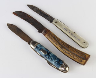 Richland Sheffield, a 3 bladed folding pocket knife with marble effect grip, some corrosion to the blade, a folding pocket knife marked ART Sheffield with horn grip, a Continental advertising folding knife the blade marked C.K Sheffield with mother of pearl grip marked Laughton and Jarett