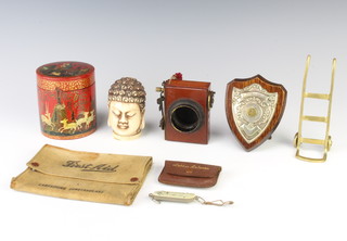 A 1930's Lancashire Constabulary cloth first aid kit case, a 1930's letter balance in leather pouch, a pair of miniature brass porter's wheels 12cm, a cylindrical Kashmiri jar and cover, a police trophy etc  