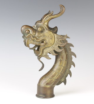 A 19th Century Chinese bronze staff head in the form of a dragon 22cm 
