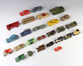 A Dinky Toys 132 model Packard, ditto Ford Sedan, ditto Triumph and ditto luxury  motor coach together with a 651 Centurion tank and a collection of Dinky and other toy cars, all play worn 