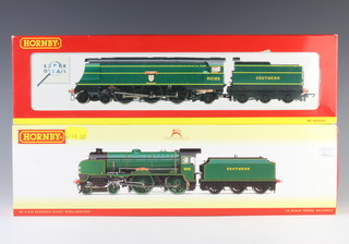 A Hornby OO gauge locomotive R2219 West Country Class Blackmoor Vale, and 1 other locomotive R2745 Schools Class Wellington, boxed  