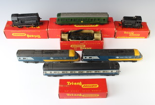 A Triang 157 diesel rail car boxed, ditto R154 diesel shunter clockwork, ditto R253 dock shunter boxed, 2 tenders and an Intercity 125 train 