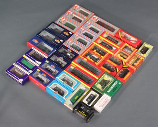 13 items of Hornby OO rolling stock,  7 items of Bachmann Branch-Line rolling stock, 8 items of Lima rolling stock and other rolling stock, all boxed  
